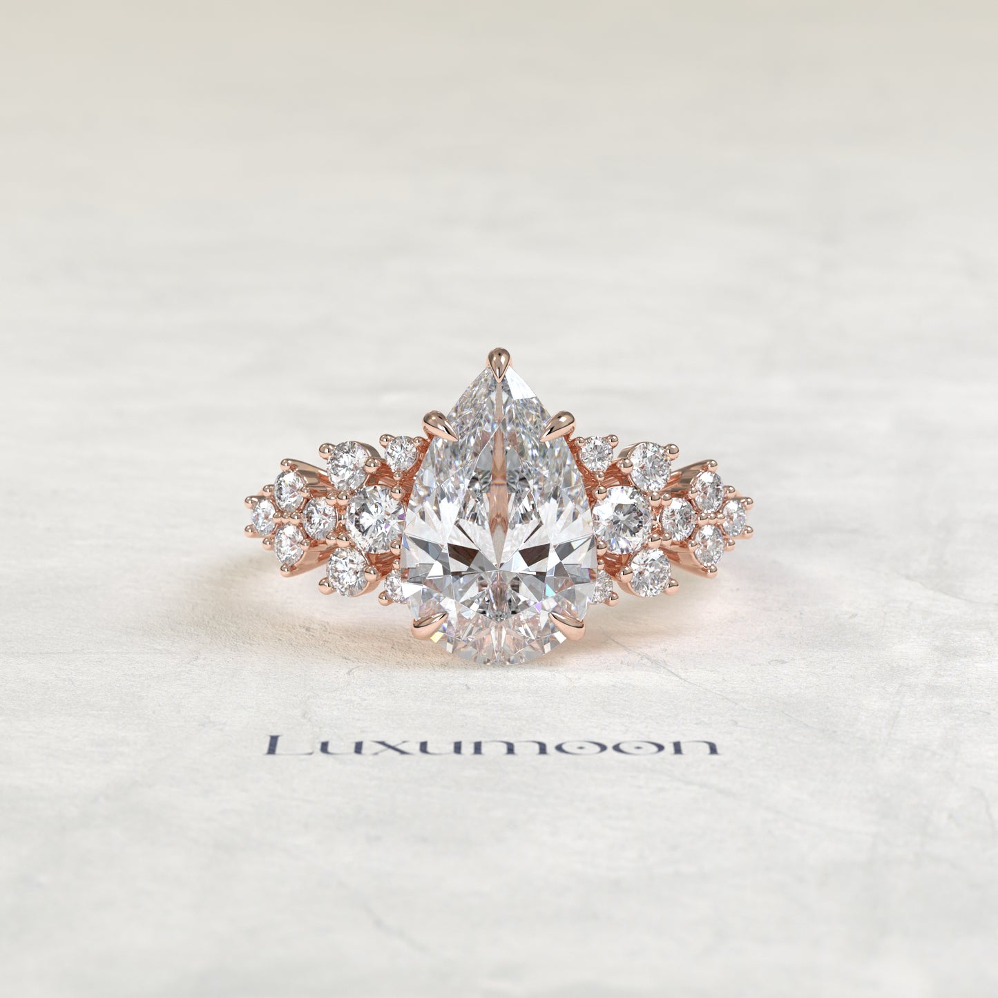 The Cora – Pear Cut Lab Grown Diamond Scattered Round Cluster Shoulder Engagement Ring