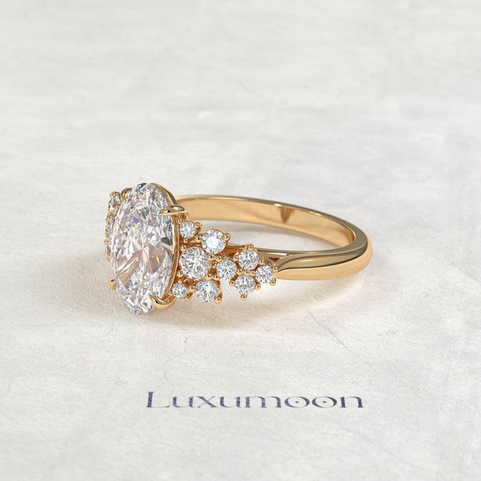 The Eira – Oval Cut Lab Grown Diamond Scattered Round Cluster Shoulder Engagement Ring