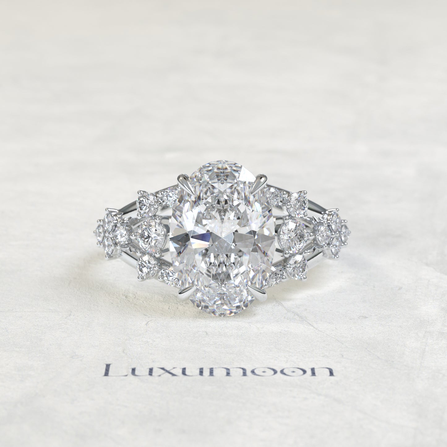 The Vora – Oval Cut Lab Grown Diamond Round Cluster Split Shank Engagement Ring