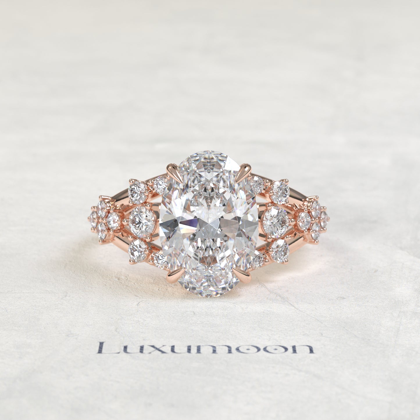 The Vora – Oval Cut Lab Grown Diamond Round Cluster Split Shank Engagement Ring