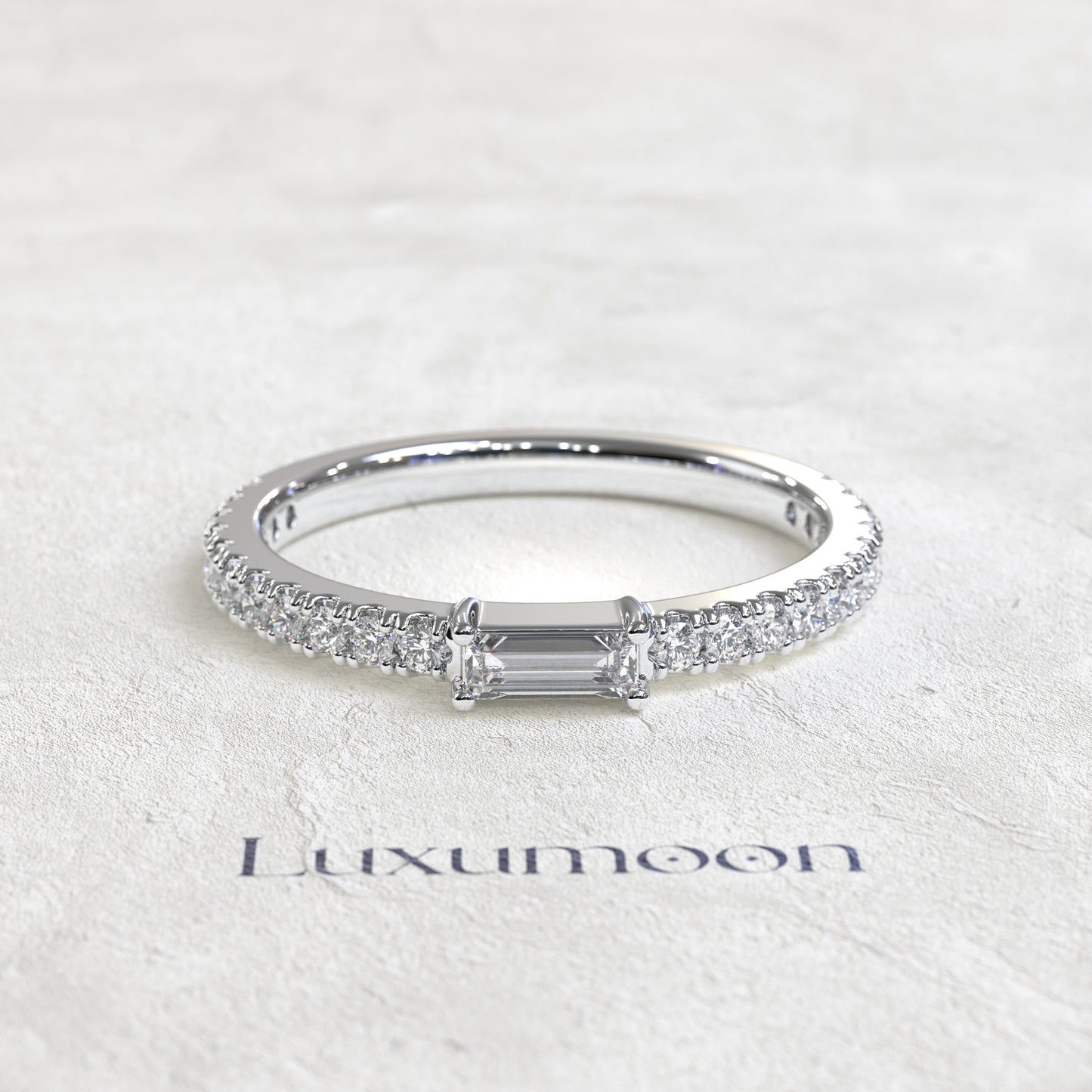 The Noéline – East-West Baguette with Pavé Round Diamond Band