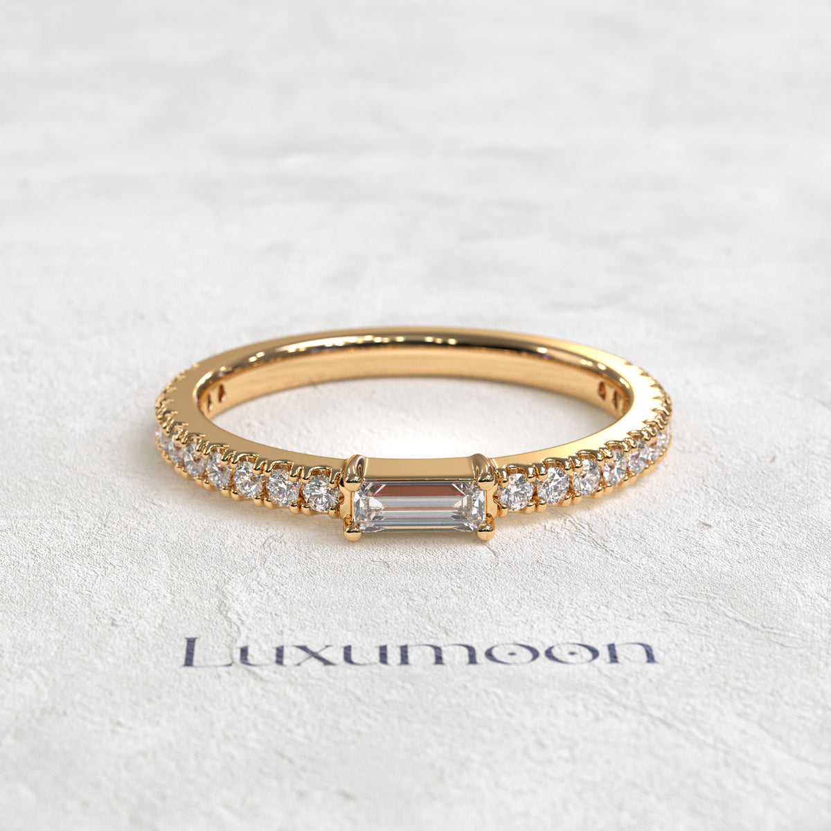 The Noéline – East-West Baguette with Pavé Round Diamond Band