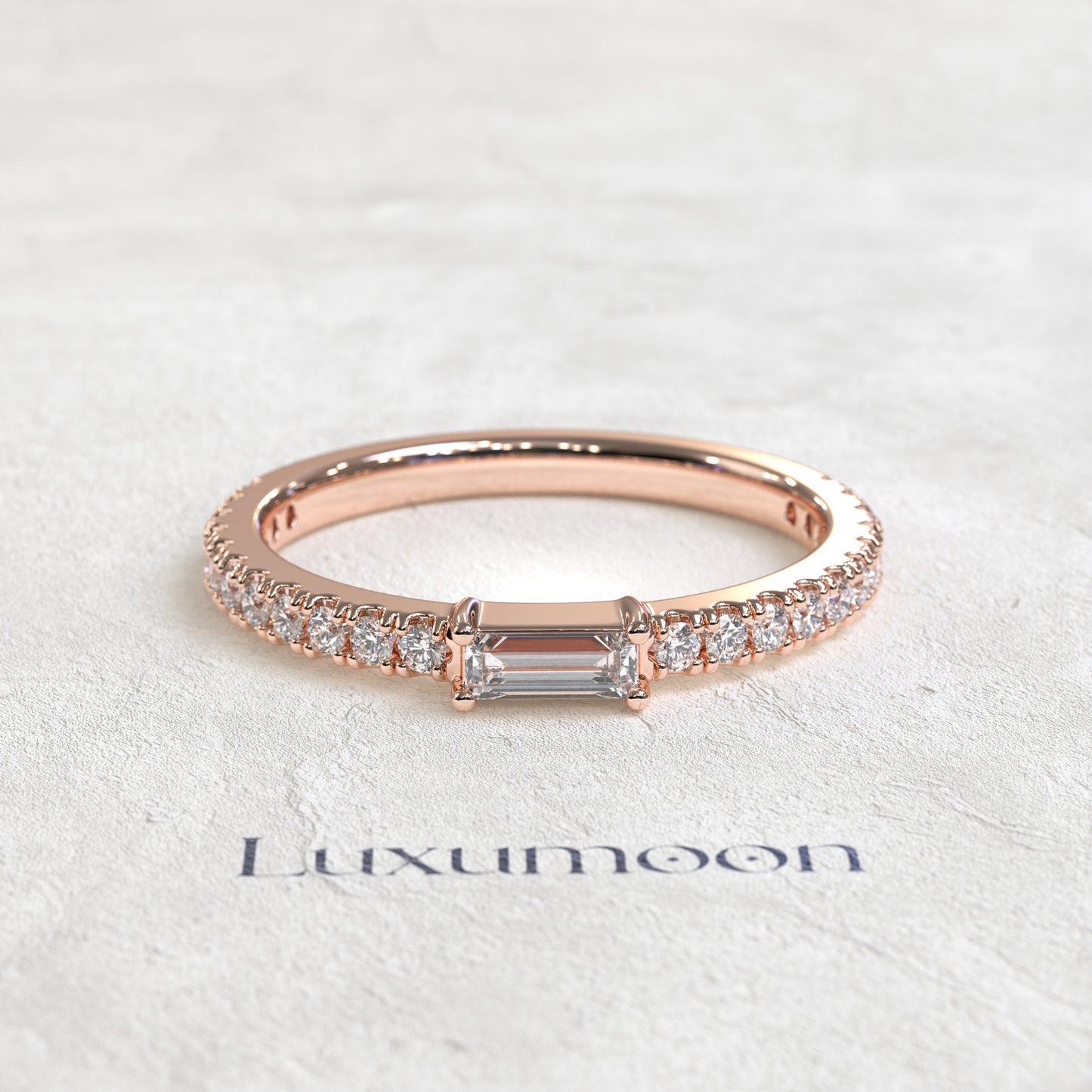 The Noéline – East-West Baguette with Pavé Round Diamond Band