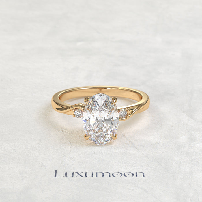 The Sorin – Oval Cut Lab Grown Diamond Twist Shank Round Side Stone Engagement Ring
