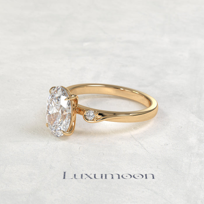 The Sorin – Oval Cut Lab Grown Diamond Twist Shank Round Side Stone Engagement Ring