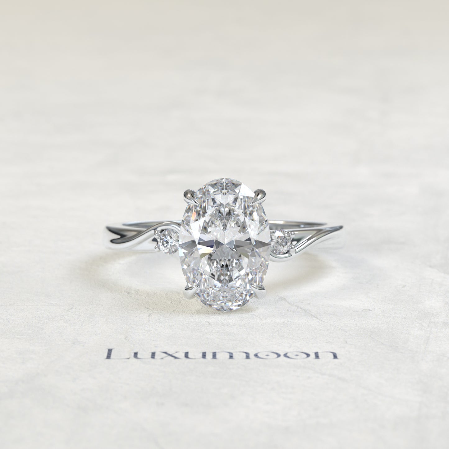 The Sorin – Oval Cut Lab Grown Diamond Twist Shank Round Side Stone Engagement Ring
