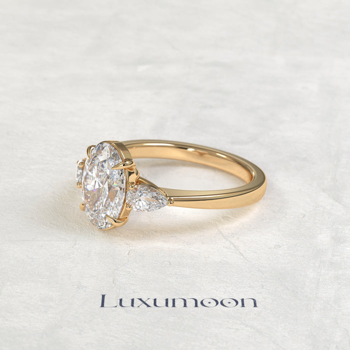 The Lyna – Oval & Pear Lab Grown Diamond Classic Three Stone Engagement Ring