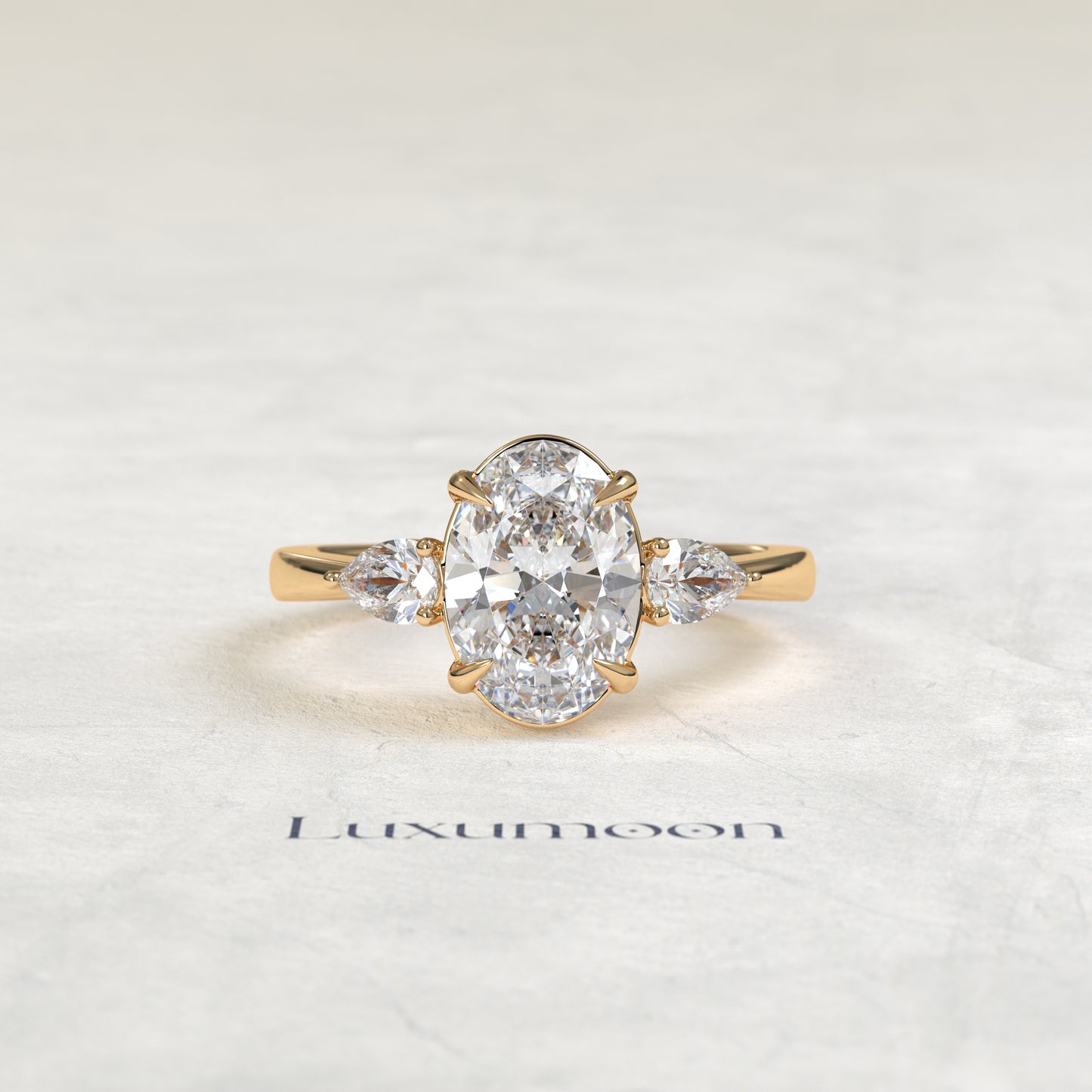 The Lyna – Oval & Pear Lab Grown Diamond Classic Three Stone Engagement Ring