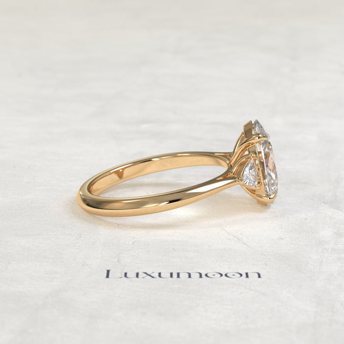 The Evara – Oval & Trillion Cut Lab Grown Diamond Three Stone Cathedral Engagement Ring