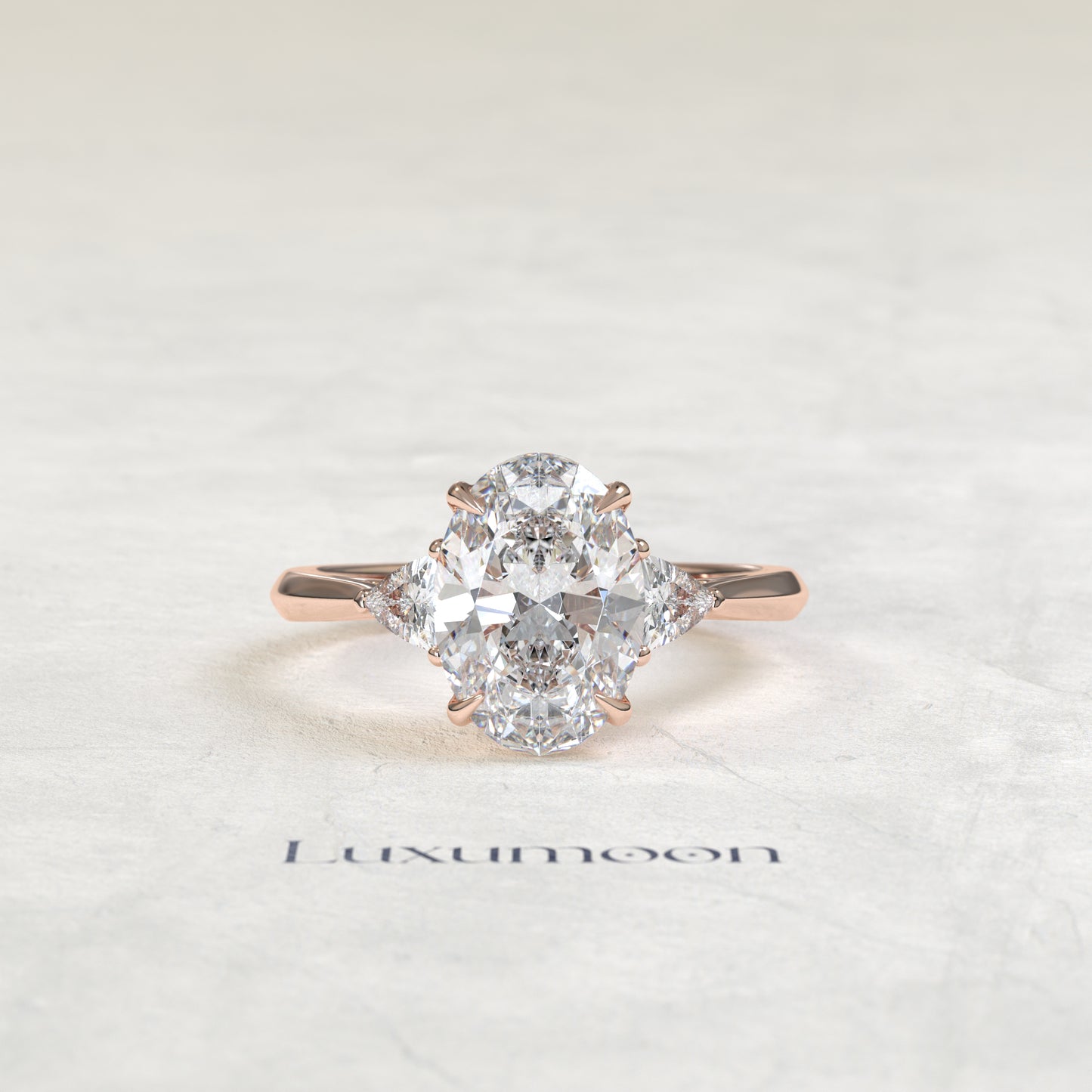 The Evara – Oval & Trillion Cut Lab Grown Diamond Three Stone Cathedral Engagement Ring