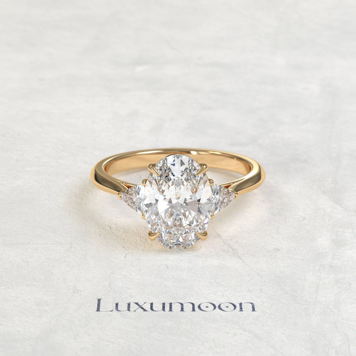 The Evara – Oval & Trillion Cut Lab Grown Diamond Three Stone Cathedral Engagement Ring