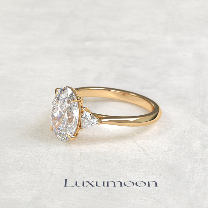 The Evara – Oval & Trillion Cut Lab Grown Diamond Three Stone Cathedral Engagement Ring