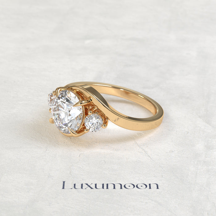 The Oryn – Round Lab Grown Diamond Three Stone Swirl Bypass Engagement Ring