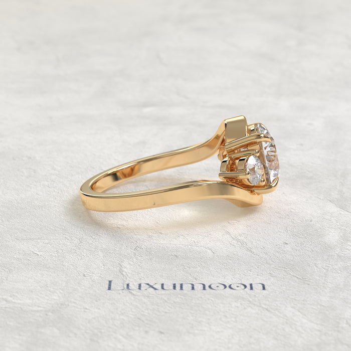 The Oryn – Round Lab Grown Diamond Three Stone Swirl Bypass Engagement Ring