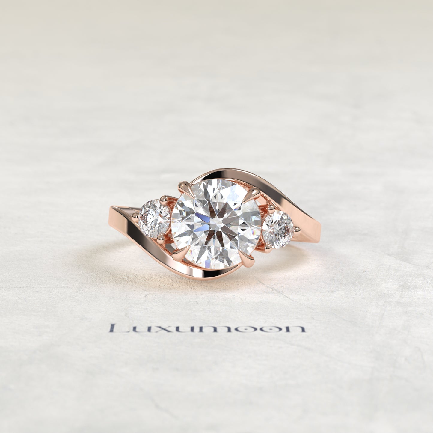 The Oryn – Round Lab Grown Diamond Three Stone Swirl Bypass Engagement Ring