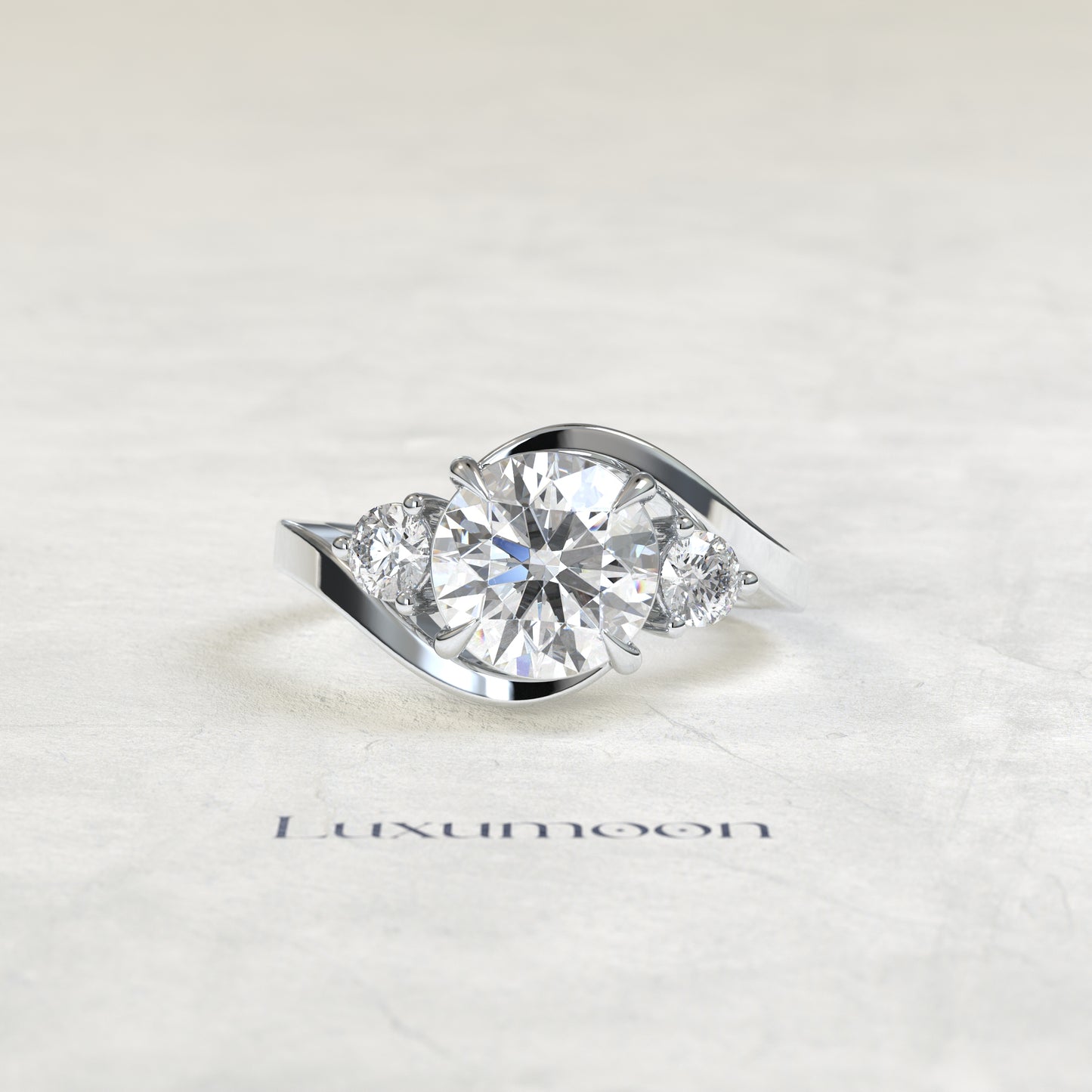 The Oryn – Round Lab Grown Diamond Three Stone Swirl Bypass Engagement Ring