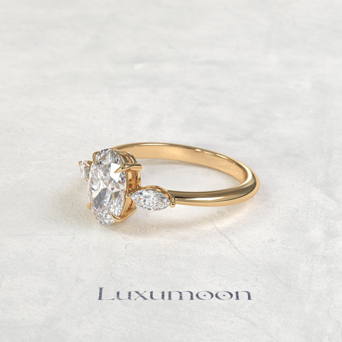 The Alova – Oval Cut Lab Grown Diamond Dainty Marquise Three Stone Engagement Ring