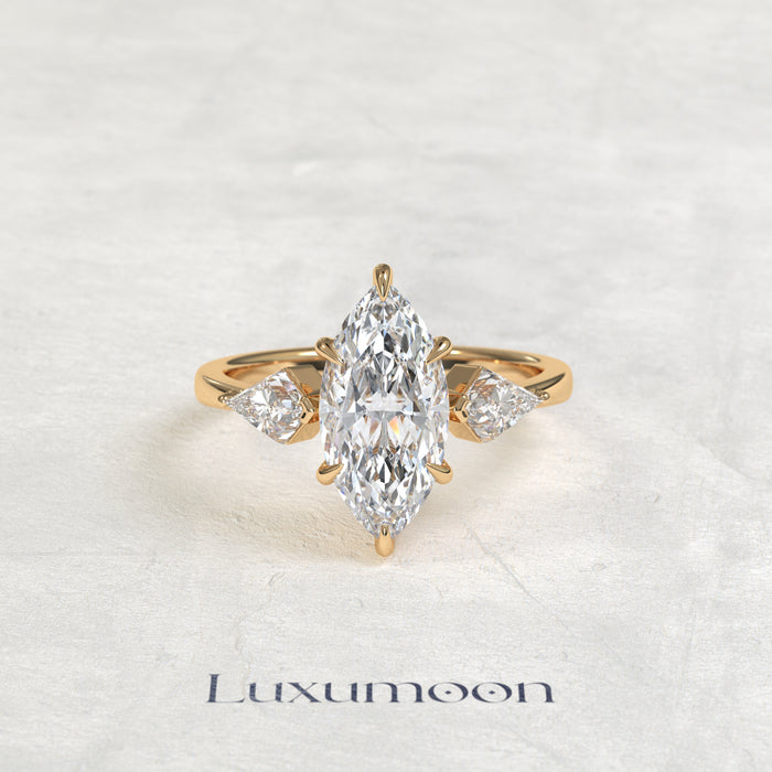 The Qela – Marquise Cut Lab Grown Diamond Kite Side Stone Three Stone Engagement Ring