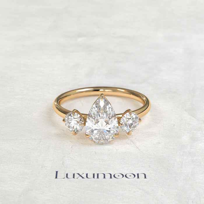 The Piela – Pear Lab Grown Diamond Three Stone Ornate Filigree Cathedral Engagement Ring
