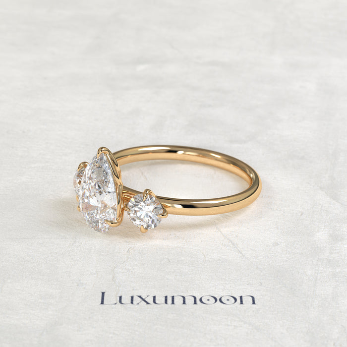The Piela – Pear Lab Grown Diamond Three Stone Ornate Filigree Cathedral Engagement Ring