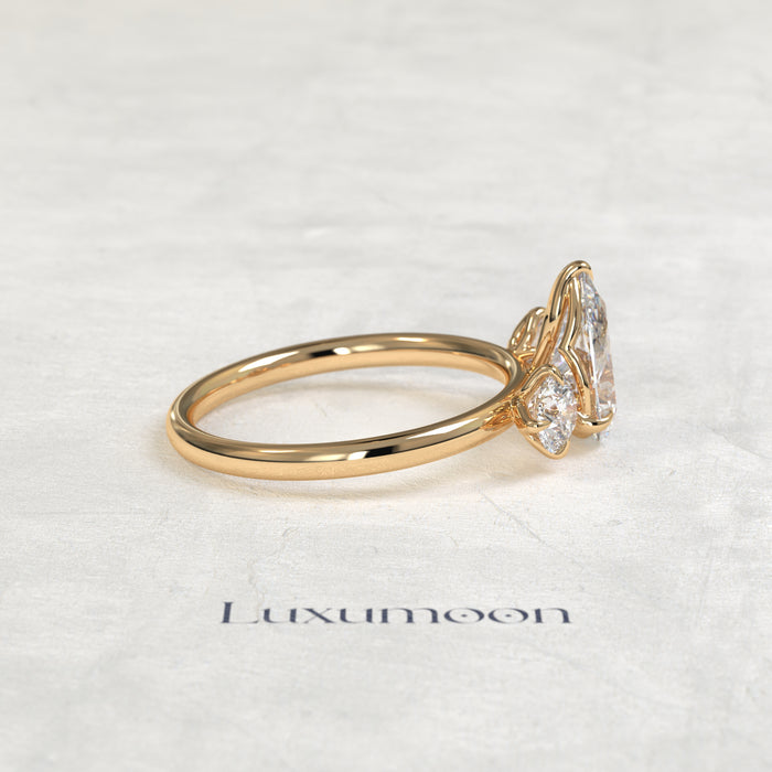 The Piela – Pear Lab Grown Diamond Three Stone Ornate Filigree Cathedral Engagement Ring