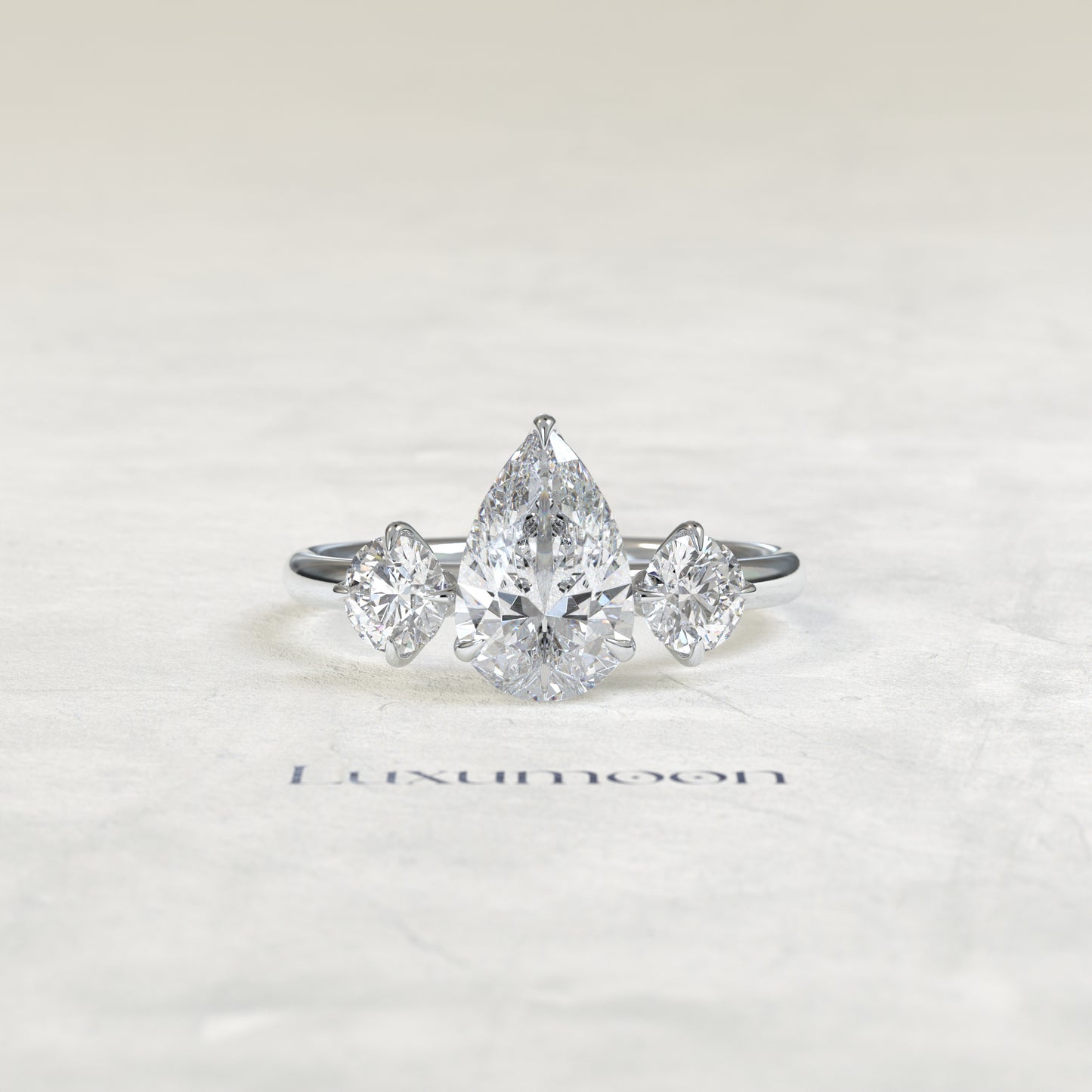 The Piela – Pear Lab Grown Diamond Three Stone Ornate Filigree Cathedral Engagement Ring