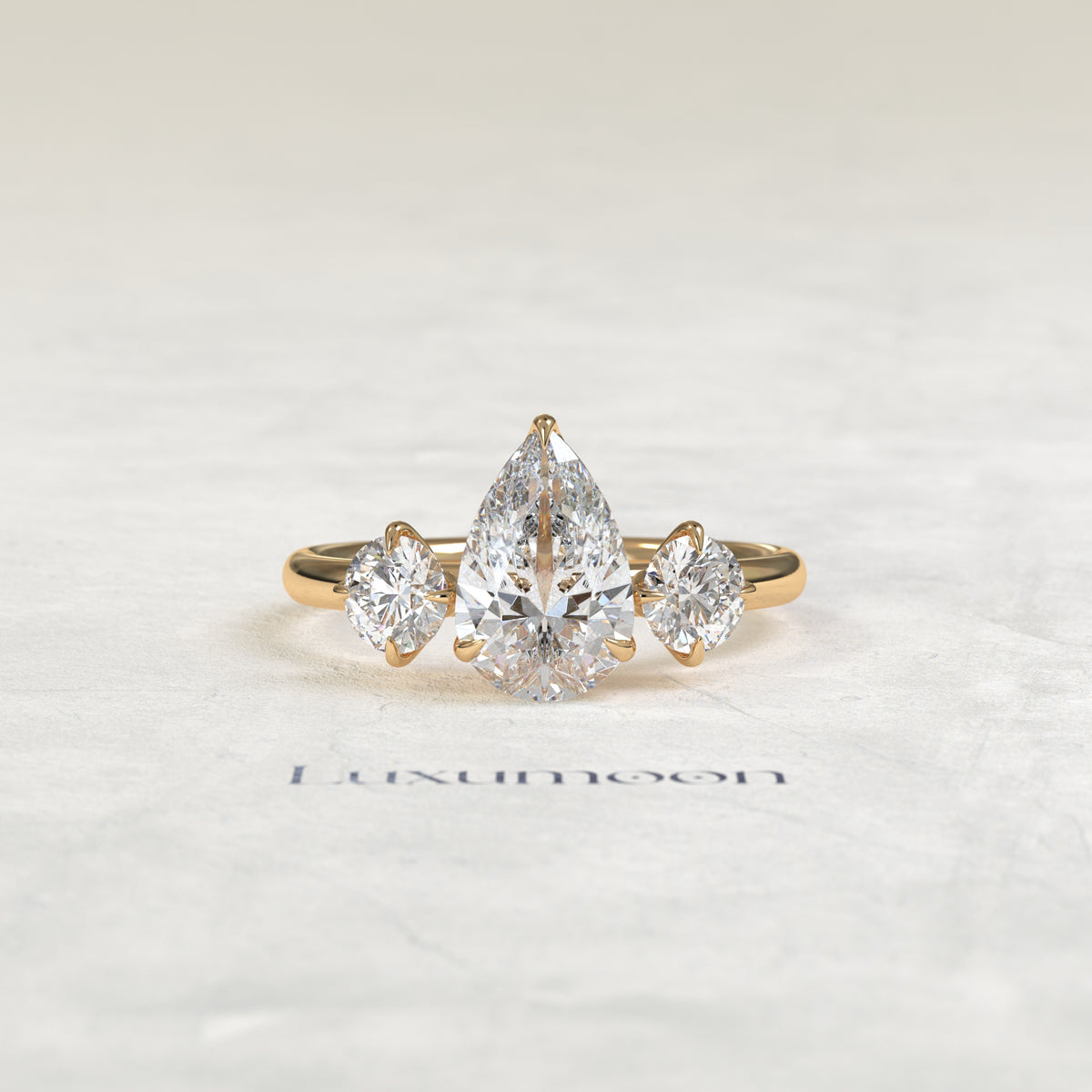 The Piela – Pear Lab Grown Diamond Three Stone Ornate Filigree Cathedral Engagement Ring