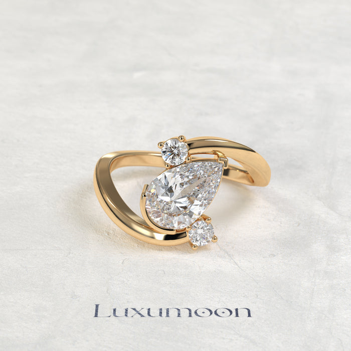 The Geova – Pear Lab Grown Diamond Open Bypass Tilted Setting Round Diamond Engagement Ring