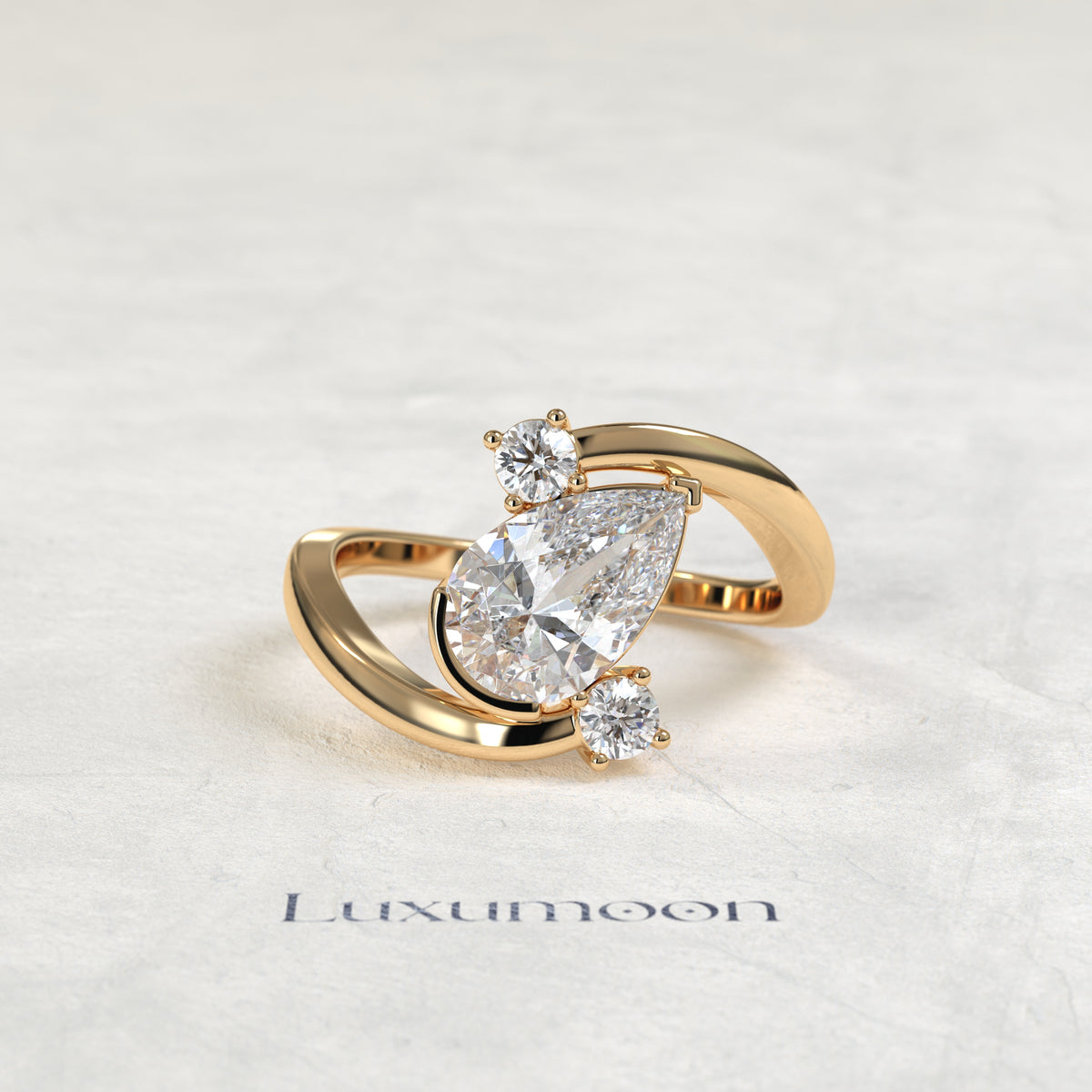The Geova – Pear Lab Grown Diamond Open Bypass Tilted Setting Round Diamond Engagement Ring