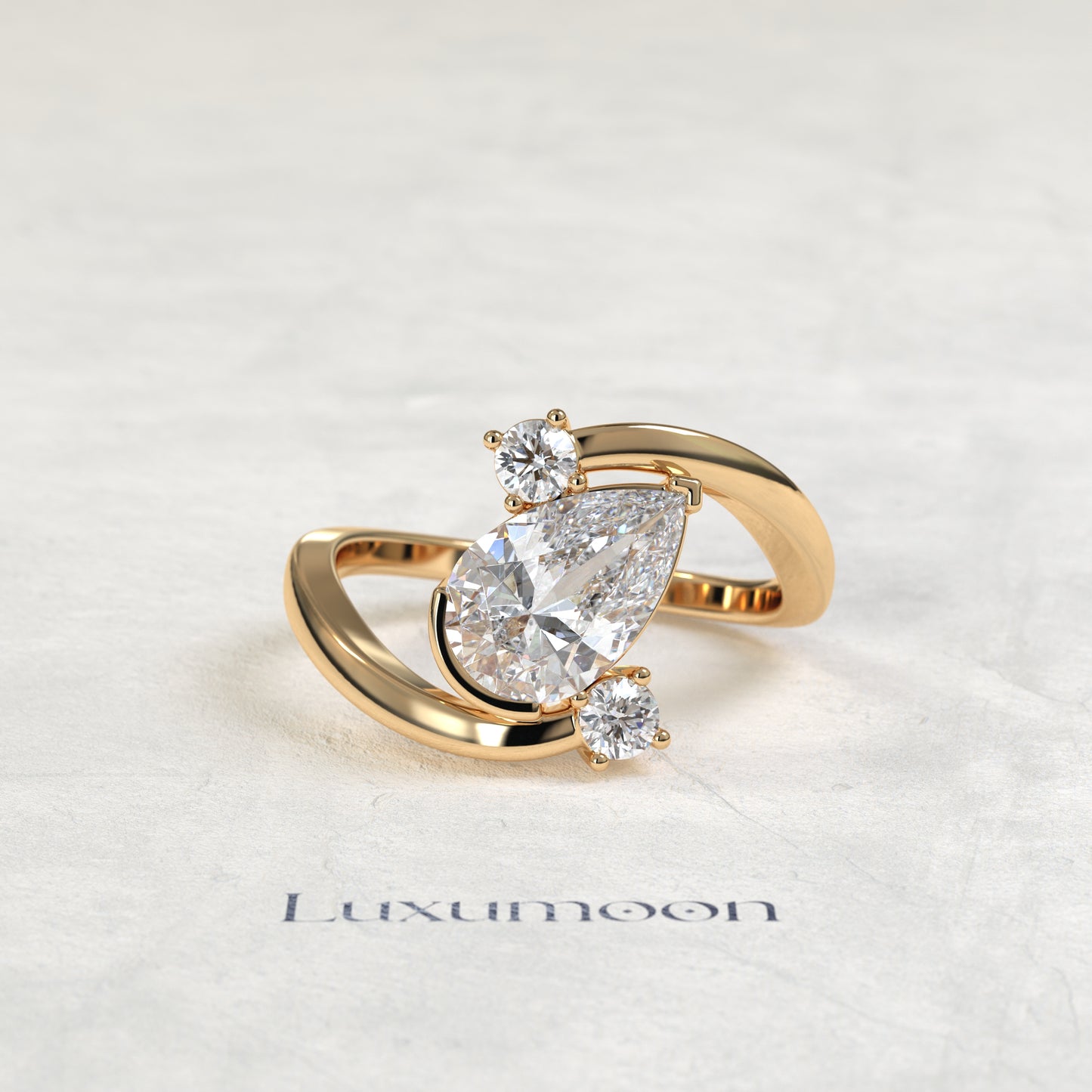The Geova – Pear Lab Grown Diamond Open Bypass Tilted Setting Round Diamond Engagement Ring