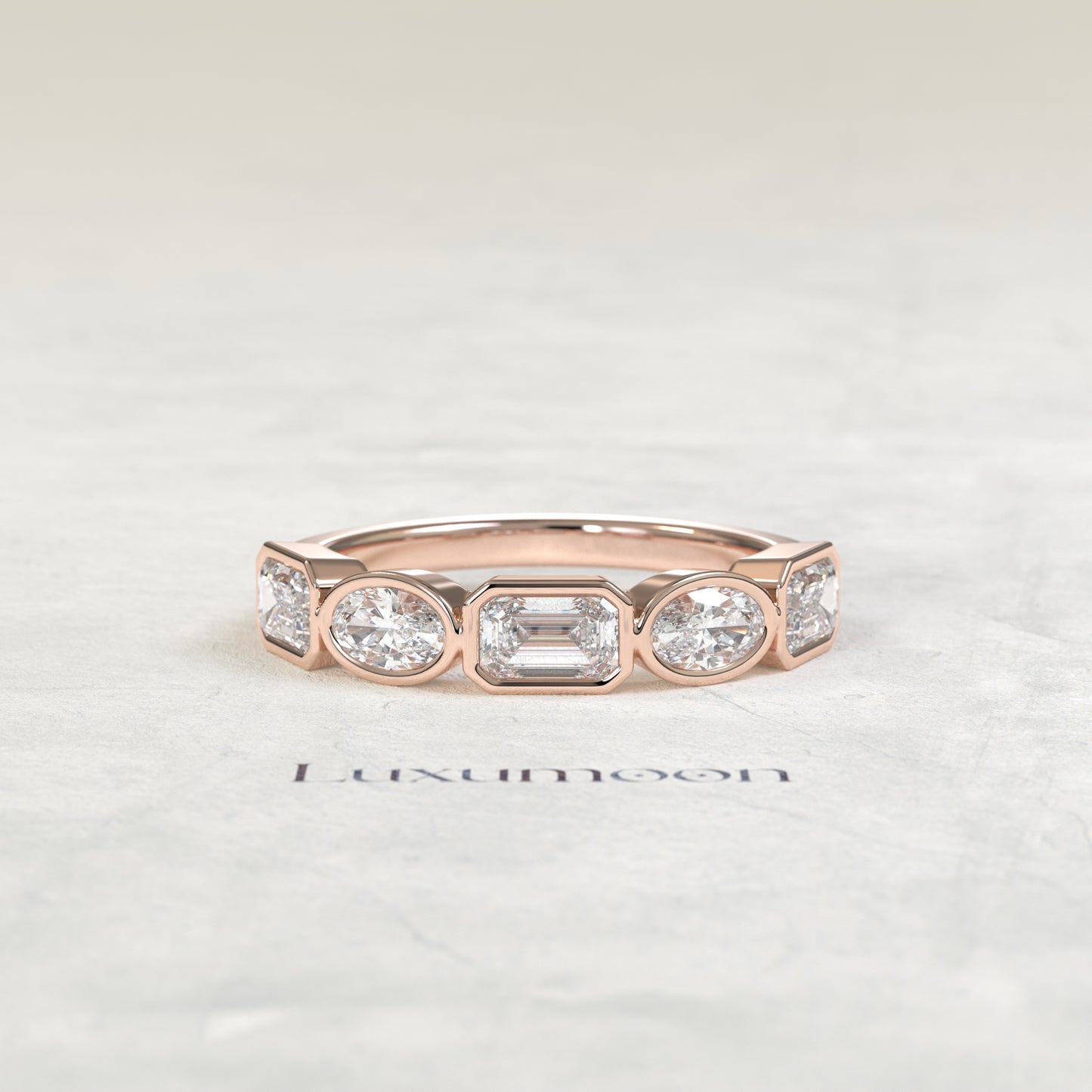 The Piria – Oval & Emerald Cut Lab Grown Diamond Five Stone Bezel Wedding Band