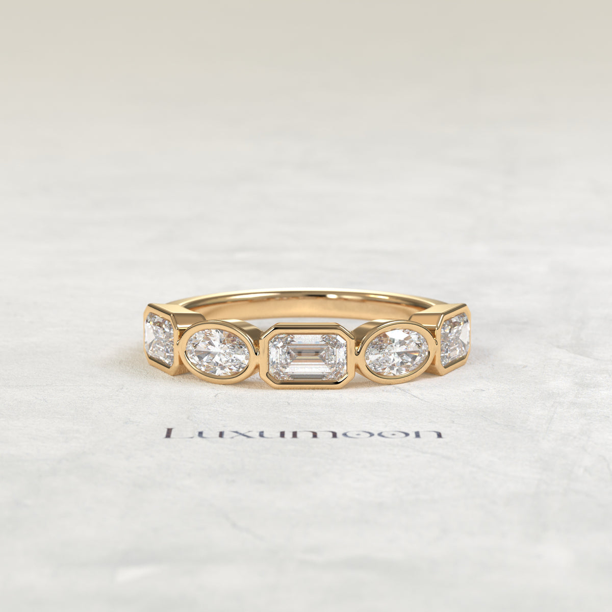 The Piria – Oval & Emerald Cut Lab Grown Diamond Five Stone Bezel Wedding Band