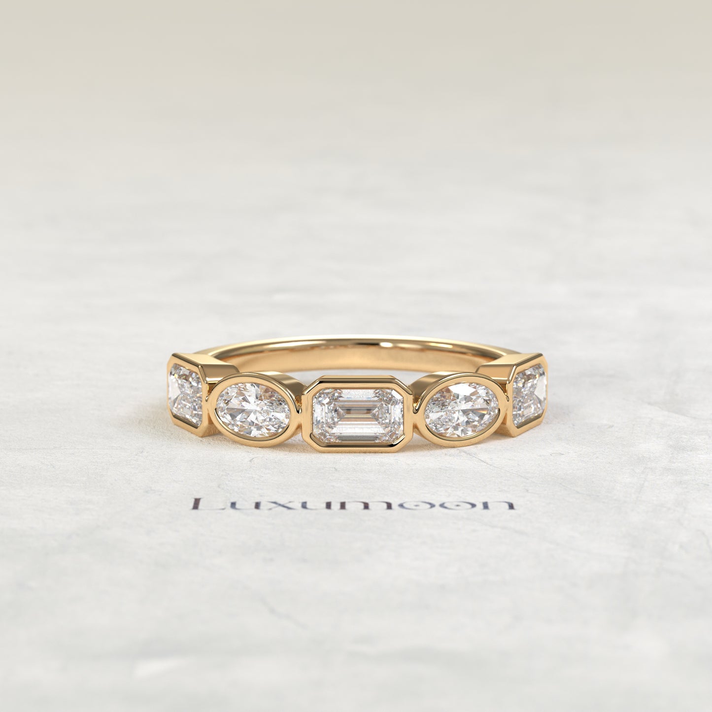The Piria – Oval & Emerald Cut Lab Grown Diamond Five Stone Bezel Wedding Band