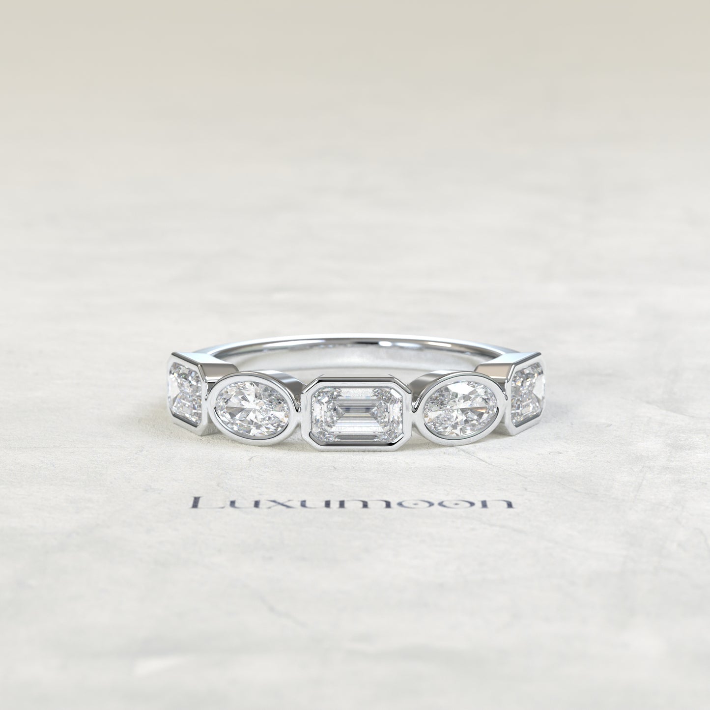 The Piria – Oval & Emerald Cut Lab Grown Diamond Five Stone Bezel Wedding Band
