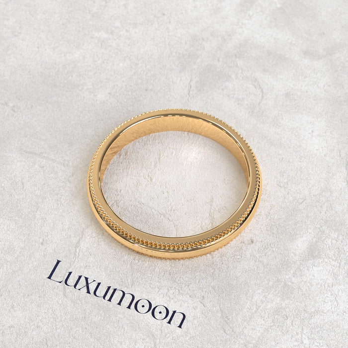 The Laxura - Solid Gold band with the millgrain work on the edges