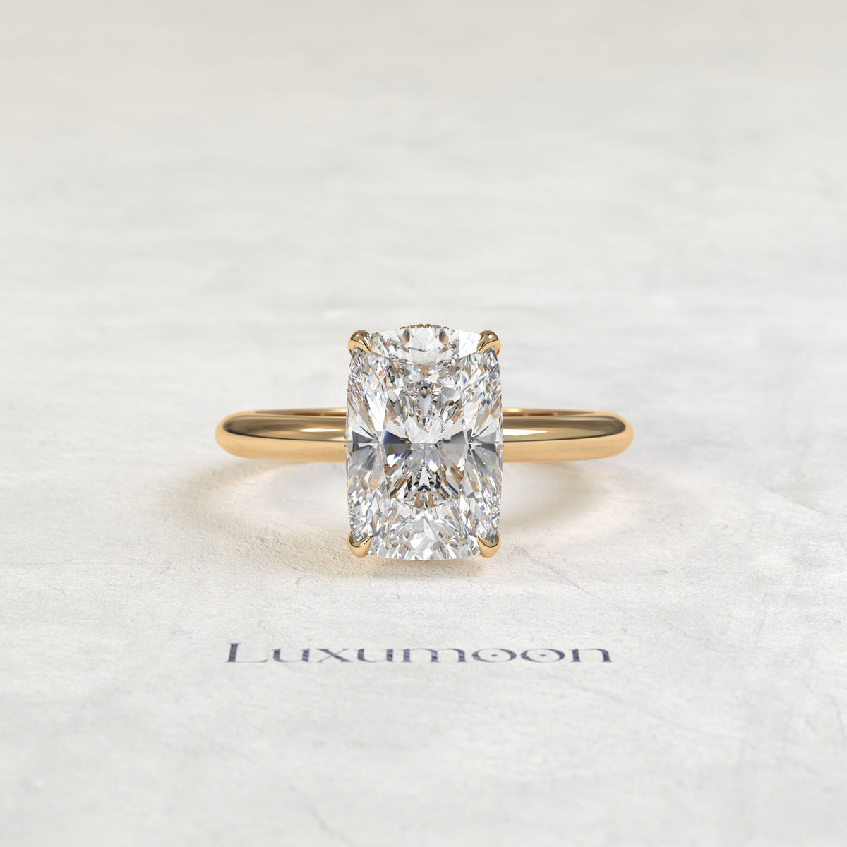 El anillo de diamantes solitario con cesta Helyra de 1,5 CT y corte de cojín alargado