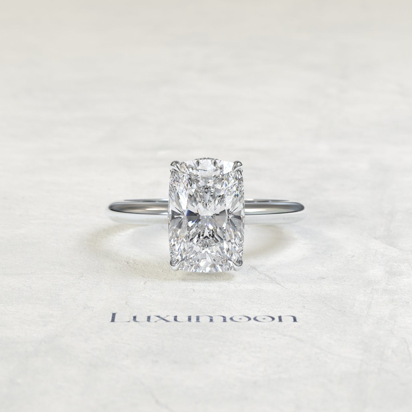 El anillo de diamantes solitario con cesta Helyra de 1,5 CT y corte de cojín alargado